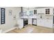Modern kitchen featuring white cabinets, stainless steel appliances, and a decorative backsplash at 16 Oatly Cir, Charleston, SC 29414