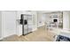 Open floor plan with kitchen featuring stainless steel appliances and dining area with hardwood floors at 16 Oatly Cir, Charleston, SC 29414