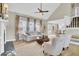 Spacious living room boasts a fireplace, vaulted ceiling, and an open concept design at 16 Oatly Cir, Charleston, SC 29414