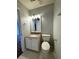 Bathroom featuring toilet, vanity with light fixture and faucet at 1705 Falcon Cove Ln, Hanahan, SC 29410