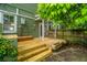 Wooden backyard patio features multi-level decking and is great for entertaining or relaxing at 173 Fishburne St, Charleston, SC 29403