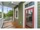 The balcony offers a great outdoor space with a glass door leading into the home's interior at 173 Fishburne St, Charleston, SC 29403