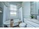 Charming bathroom features a clawfoot tub, white vanity, and neutral wall color at 173 Fishburne St, Charleston, SC 29403
