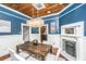 Dining room with stairs to upper floor and glimpses into the kitchen at 173 Fishburne St, Charleston, SC 29403