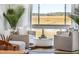 Bright living room featuring stylish furniture, a view, and natural light at 1815 Long Bend Dr, Seabrook Island, SC 29455