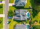 A well-maintained property featuring a private backyard pool, lush greenery, and a meticulously kept lawn at 185 Red Leaf Blvd, Moncks Corner, SC 29461