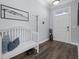 Inviting foyer with stylish bench, coat rack, and dark hardwood floors at 185 Red Leaf Blvd, Moncks Corner, SC 29461