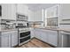 Well-equipped kitchen features stainless appliances and ample counter space at 185 Red Leaf Blvd, Moncks Corner, SC 29461