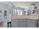 Open floorplan with kitchen featuring granite counters and view to the living room at 185 Red Leaf Blvd, Moncks Corner, SC 29461