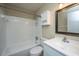 The bathroom features tile shower, white vanity, and a stylish dark framed mirror at 2003 Savage Rd, Charleston, SC 29407