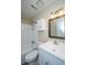 The bathroom features tile shower, white vanity, and a stylish framed mirror with modern lighting at 2003 Savage Rd, Charleston, SC 29407