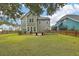 Green lawn and patio with outdoor seating at 202 Center Hill Ct, Summerville, SC 29485