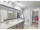Spacious Primary bathroom with dual sinks, large mirror, and walk-in closet at 202 Center Hill Ct, Summerville, SC 29485