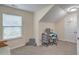 Bright bedroom features a window, desk, and neutral carpet at 202 Center Hill Ct, Summerville, SC 29485
