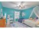 Colorful bedroom with unique decor, a ceiling fan, and comfortable furnishings at 202 Center Hill Ct, Summerville, SC 29485
