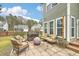 Outdoor patio featuring comfortable seating and inviting firepit at 202 Center Hill Ct, Summerville, SC 29485