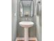 Clean powder room with pedestal sink and light gray walls at 202 Center Hill Ct, Summerville, SC 29485