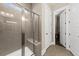 Walk-in tiled shower with glass door and bench seating in this luxurious bathroom at 2208 Primus Rd, Mount Pleasant, SC 29466