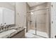 Modern bathroom boasts a granite countertop, sleek fixtures, and a glass-enclosed shower with tile surround at 2208 Primus Rd, Mount Pleasant, SC 29466