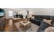 Bonus room with hardwood floors, comfortable seating, and a dedicated office space at 2208 Primus Rd, Mount Pleasant, SC 29466