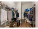 Spacious walk-in closet with shelving, hanging rods, and wood-look floors at 2208 Primus Rd, Mount Pleasant, SC 29466
