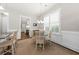 Bright dining area featuring a classic table set, a jute rug, and lots of natural light at 2208 Primus Rd, Mount Pleasant, SC 29466