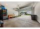 Well-lit garage featuring an automatic door opener and ample space for parking and storage at 2208 Primus Rd, Mount Pleasant, SC 29466