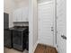 Laundry area equipped with modern appliances, storage cabinets and a convenient folding area at 2208 Primus Rd, Mount Pleasant, SC 29466