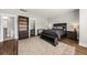 Comfortable main bedroom featuring a walk-in closet, stylish rug, and warm lighting for a cozy ambiance at 2208 Primus Rd, Mount Pleasant, SC 29466