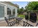 Charming patio space with stylish outdoor furniture, perfect for relaxing and enjoying the backyard view at 2208 Primus Rd, Mount Pleasant, SC 29466