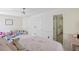 bedroom featuring a dollhouse, pink tea table, and an adjoining bathroom at 2225 Black Oak Ct, Mount Pleasant, SC 29466