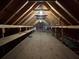 Spacious unfinished attic area with exposed beams, providing potential for storage or customization at 236 Chamblee Rd, Walterboro, SC 29488