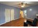 Spacious bedroom with ample closet space, a ceiling fan, and access to an ensuite bathroom at 236 Chamblee Rd, Walterboro, SC 29488