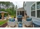 Outdoor patio with wicker seating, grilling area and gazebo at 259 Camber Rd, Huger, SC 29450