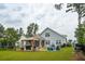 Backyard features a gazebo, grill, and outdoor seating at 259 Camber Rd, Huger, SC 29450