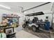 Tidy garage with a custom golf cart, showcasing practical storage solutions at 259 Camber Rd, Huger, SC 29450
