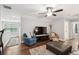 Living room featuring comfortable seating, hardwood floors, and stylish décor, perfect for relaxation at 259 Camber Rd, Huger, SC 29450