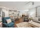 Inviting living room with an open-concept layout connecting the kitchen and dining area, perfect for modern living at 259 Camber Rd, Huger, SC 29450