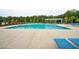 Large, inviting pool with lounge chairs and a nearby playground at 259 Camber Rd, Huger, SC 29450