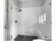 Modern bathroom featuring a glass-enclosed shower with stylish tile and a built-in bench at 2769 Rivertowne Pkwy, Mount Pleasant, SC 29466