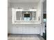 Bright bathroom with double vanity, featuring a large mirror and ample cabinet space at 2769 Rivertowne Pkwy, Mount Pleasant, SC 29466