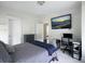 Bedroom with a wall mounted TV and a view into an adjacent room at 2769 Rivertowne Pkwy, Mount Pleasant, SC 29466