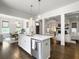 Open floor plan shows the Kitchen island, Living Room and Dining Room areas at 2769 Rivertowne Pkwy, Mount Pleasant, SC 29466