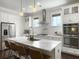 Bright kitchen with marble island, stainless steel appliances, and modern lighting at 2769 Rivertowne Pkwy, Mount Pleasant, SC 29466