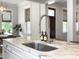 Close-up on the kitchen sink and marble countertop at 2769 Rivertowne Pkwy, Mount Pleasant, SC 29466
