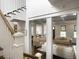 Open floorplan showcasing stairway with a view of an inviting living room with neutral decor at 2769 Rivertowne Pkwy, Mount Pleasant, SC 29466