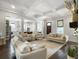 Bright and airy living room featuring plush seating and an open floor plan at 2769 Rivertowne Pkwy, Mount Pleasant, SC 29466
