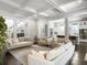 Bright and airy living room featuring plush seating and an open floor plan to the kitchen at 2769 Rivertowne Pkwy, Mount Pleasant, SC 29466