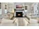 Inviting living room with a cozy fireplace and bright natural light at 2769 Rivertowne Pkwy, Mount Pleasant, SC 29466