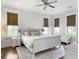 Comfortable main bedroom featuring hardwood floors, natural light and neutral decor at 2769 Rivertowne Pkwy, Mount Pleasant, SC 29466